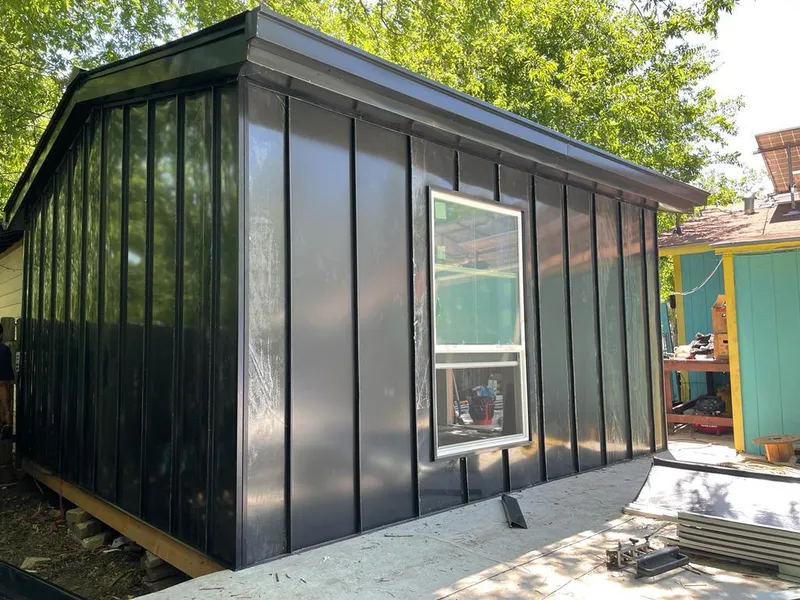 Black standing seam metal wall panels for Roof Inspection in Anthony